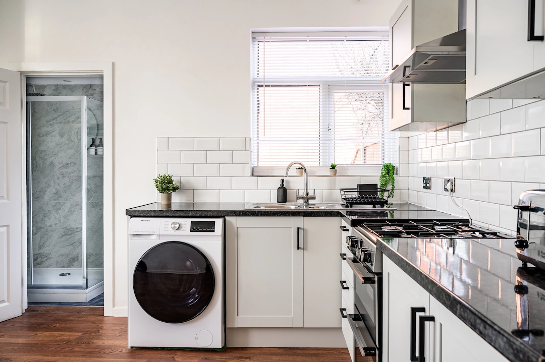Manchester serviced apartment kitchen and workspace